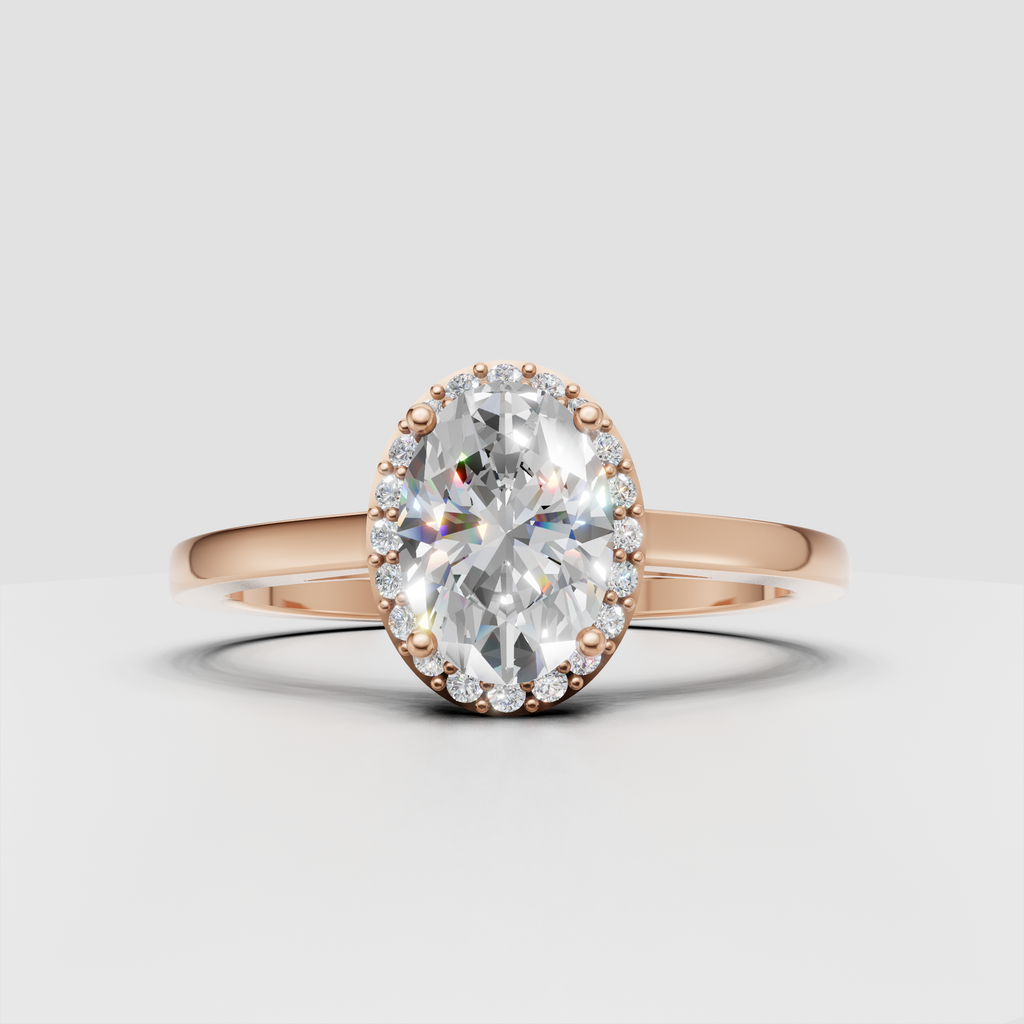 Luxury oval diamond ring with four-prong center setting and halo