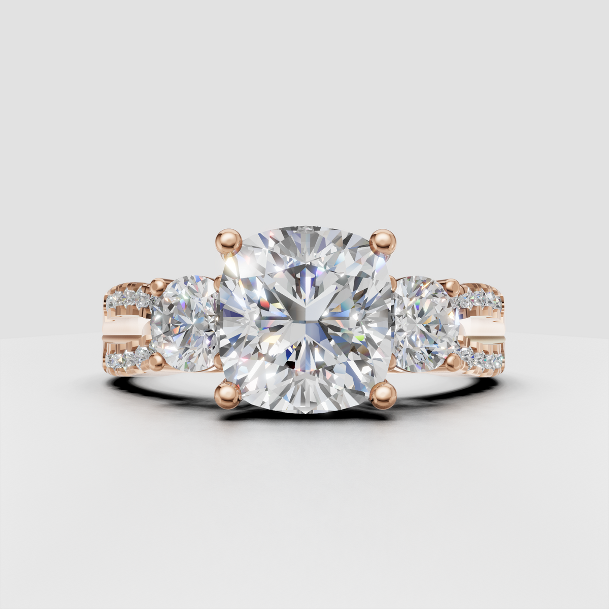 Cushion cut center diamond with round side stones