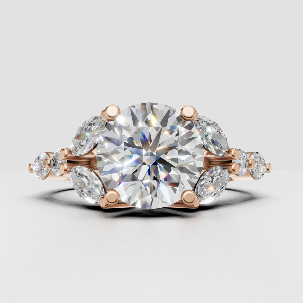 Nature inspired engagement ring with round center diamond and marquise cluster