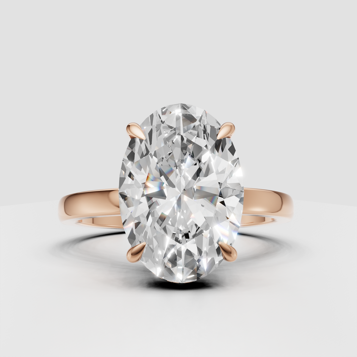 Yellow gold engagement ring featuring oval diamond