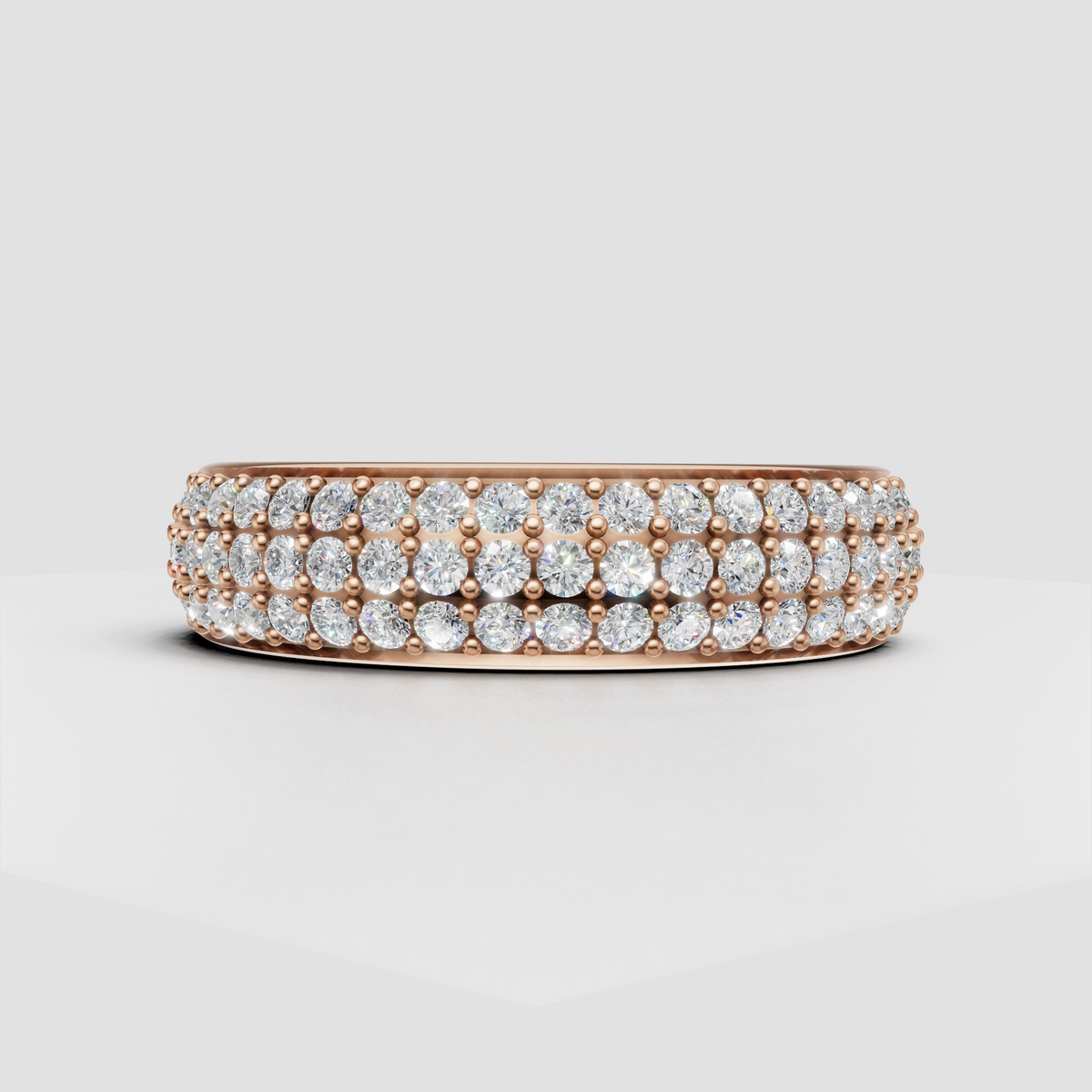Elegant three row diamond band in yellow gold