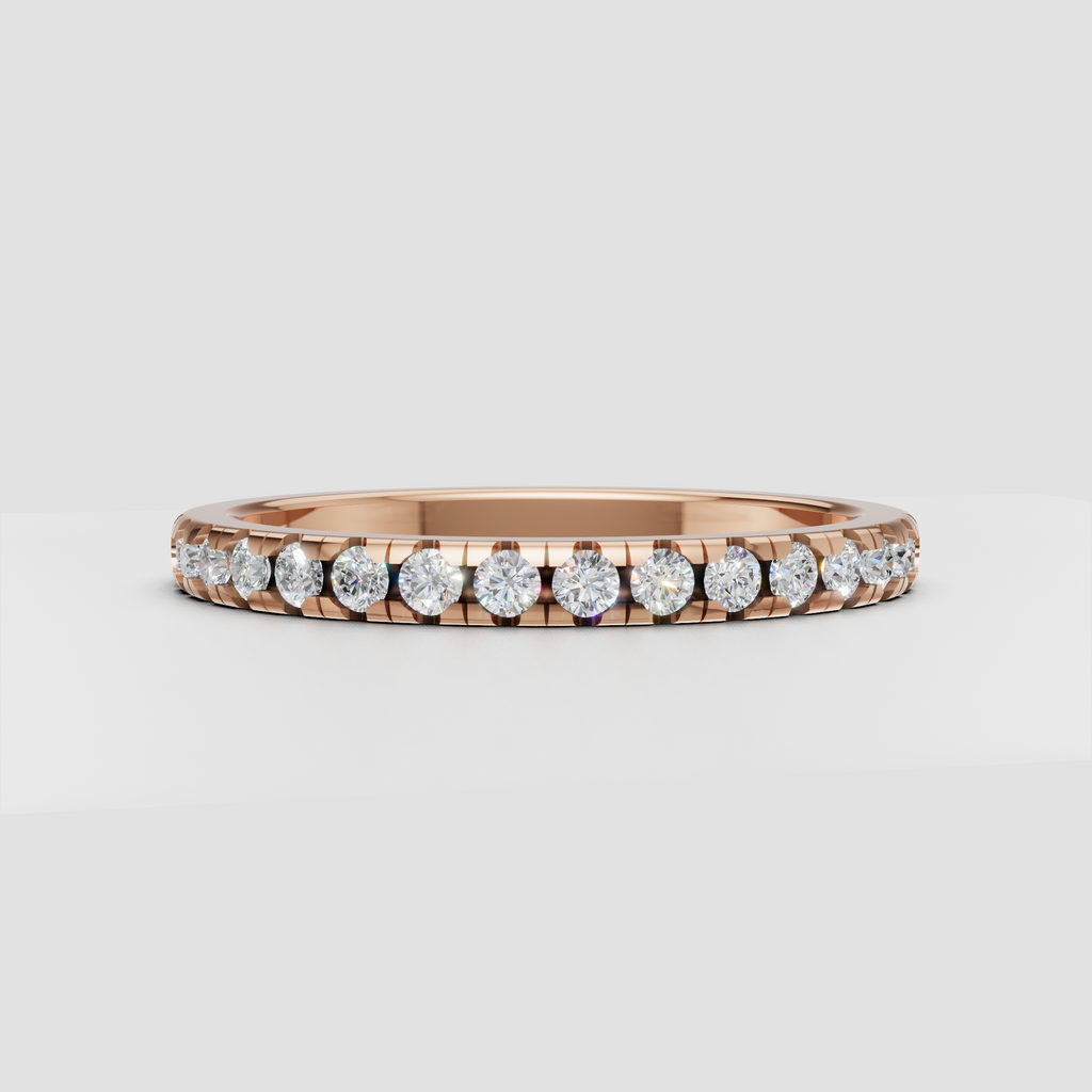 Round brilliant diamond band with refined shared prong setting
