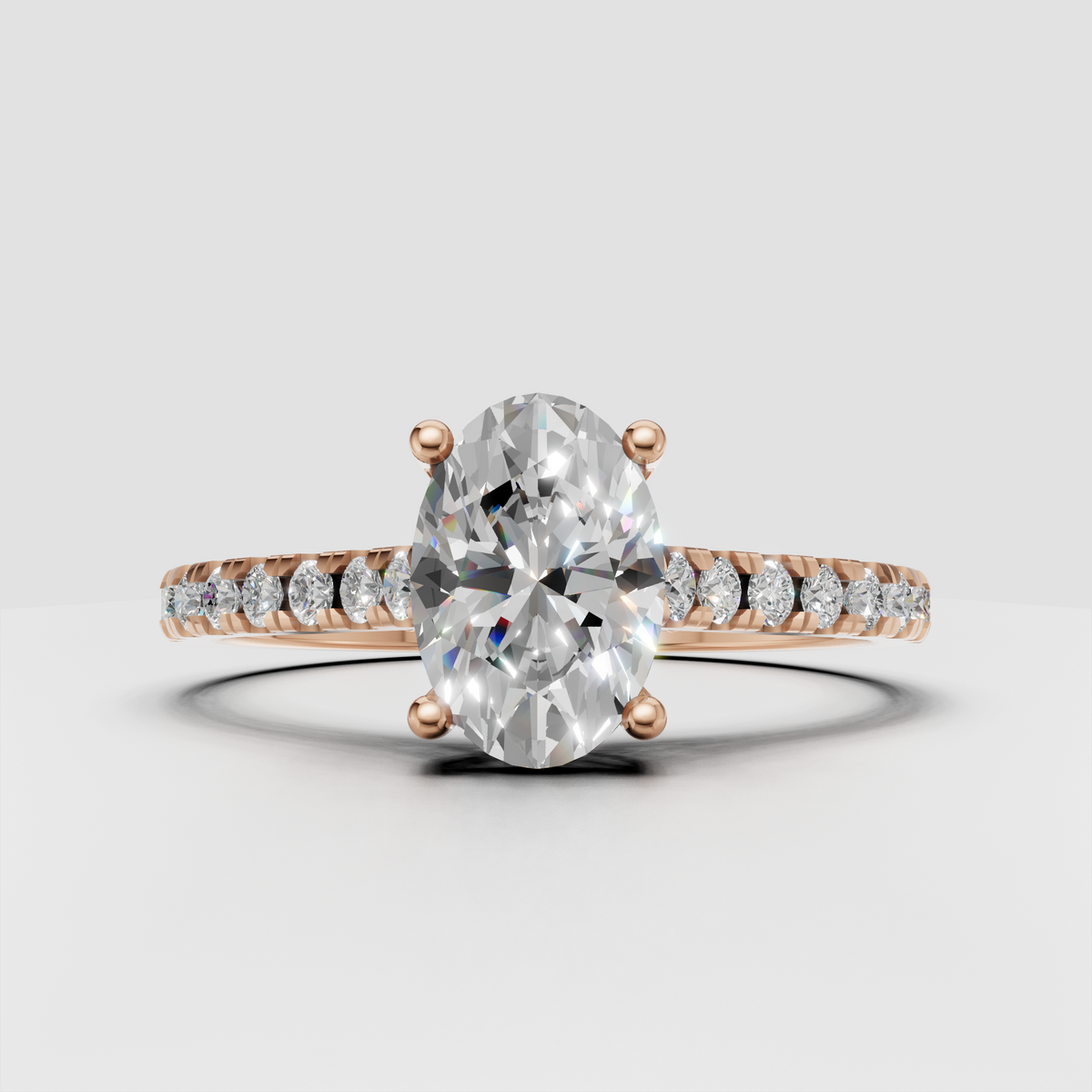 Classic oval diamond engagement ring in yellow gold