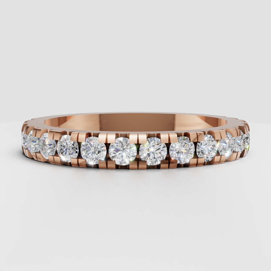 Sophisticated round diamond eternity band in polished metal