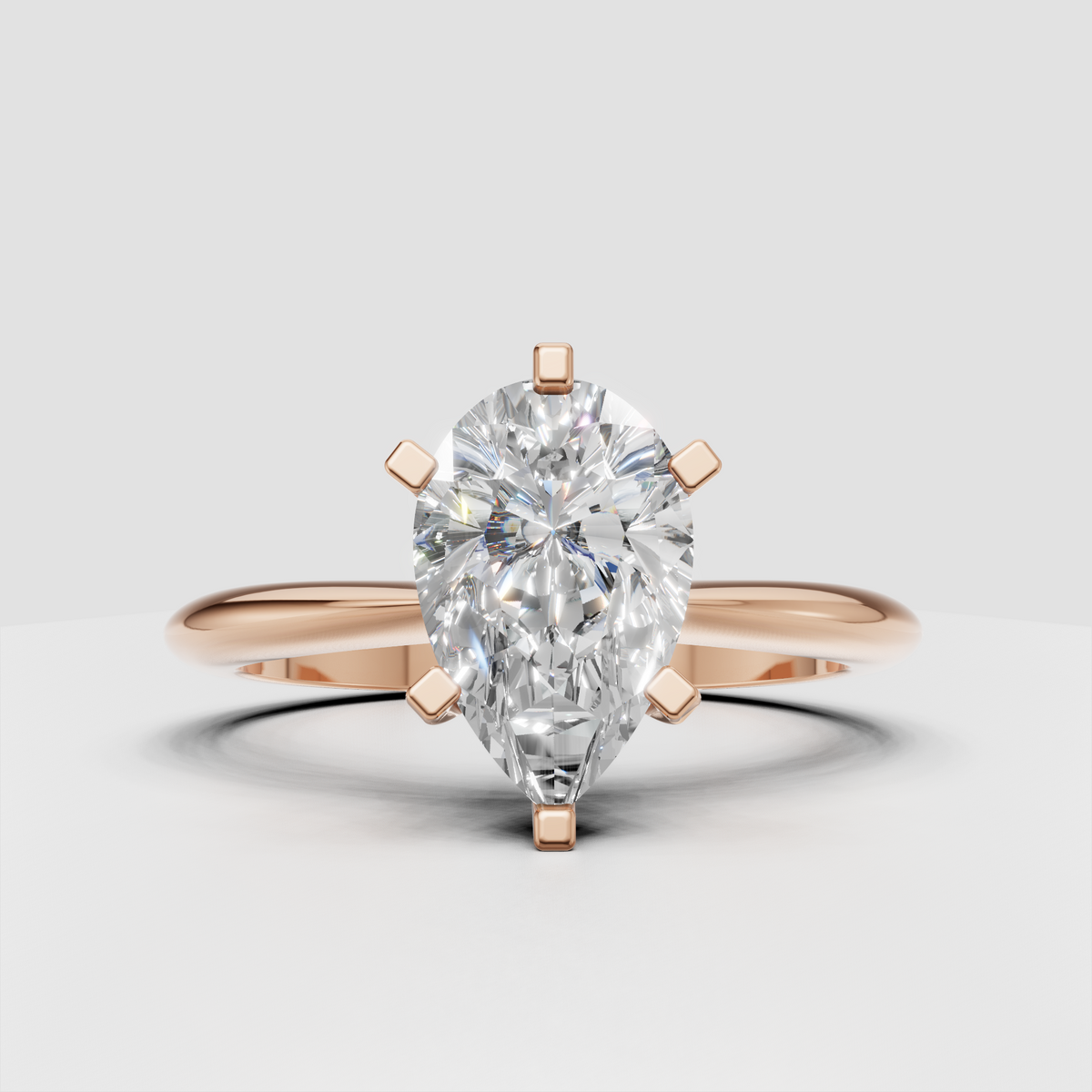 Detailed view of pear diamond solitaire setting with rounded prongs