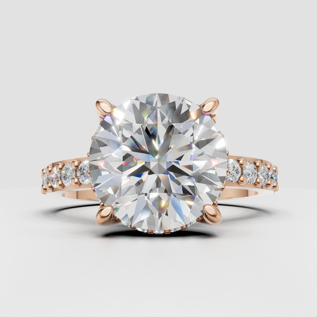 Round diamond engagement ring with sculptural prong setting