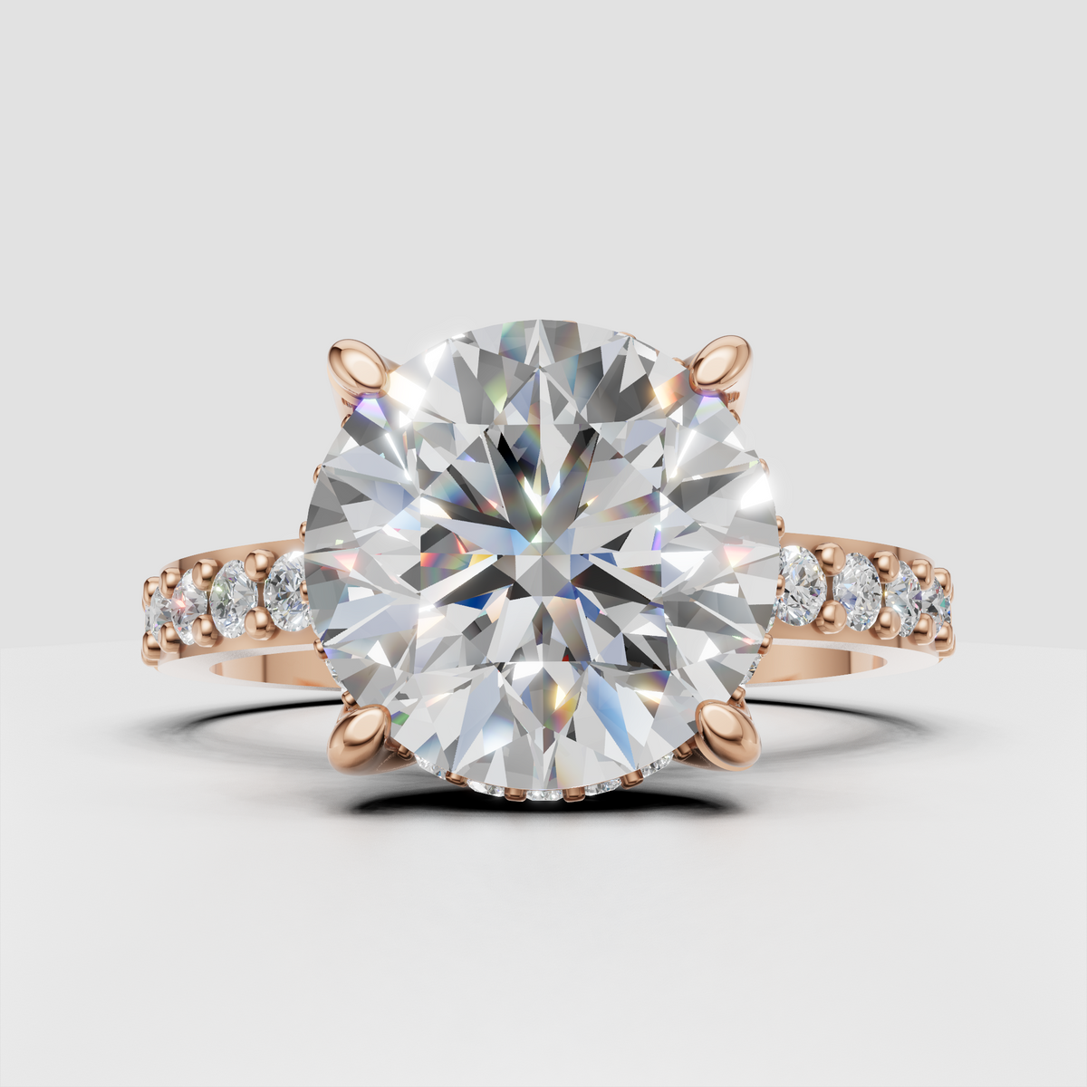 Round diamond engagement ring with sculptural prong setting