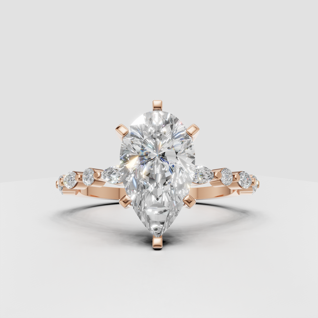 Marquise diamond engagement ring with round and marquise side stones