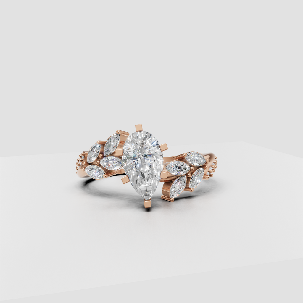 Pear shaped diamond ring with marquise leaf accent stones