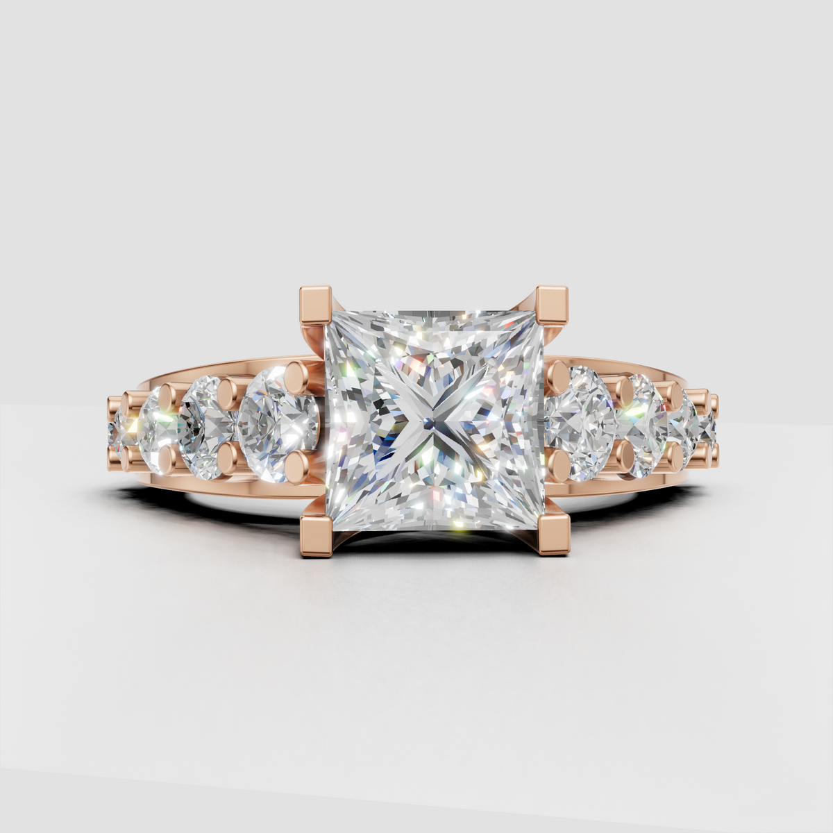 Split shank princess diamond engagement ring with sparkling accent stones