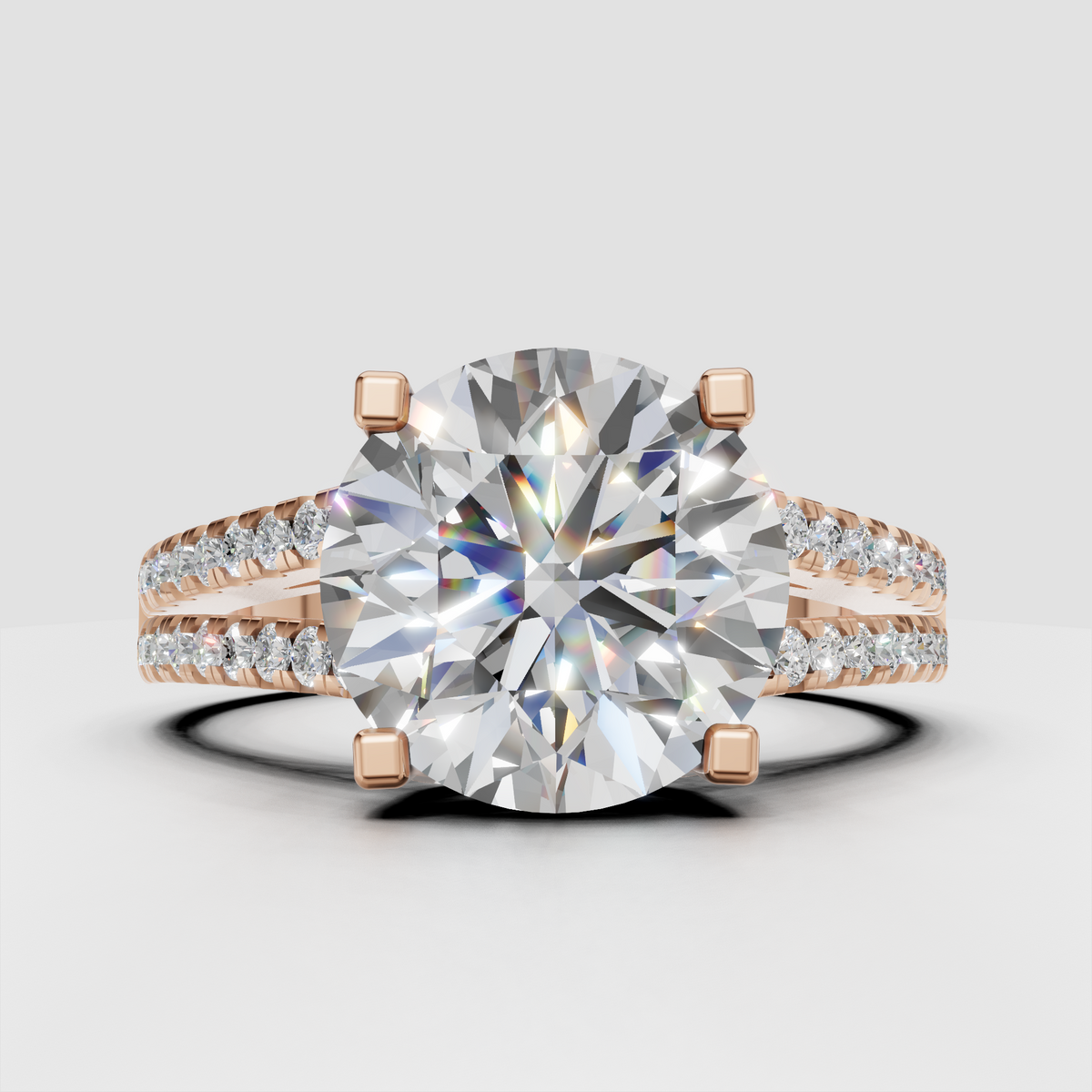 Round diamond solitaire ring with sparkling pavé split shank band