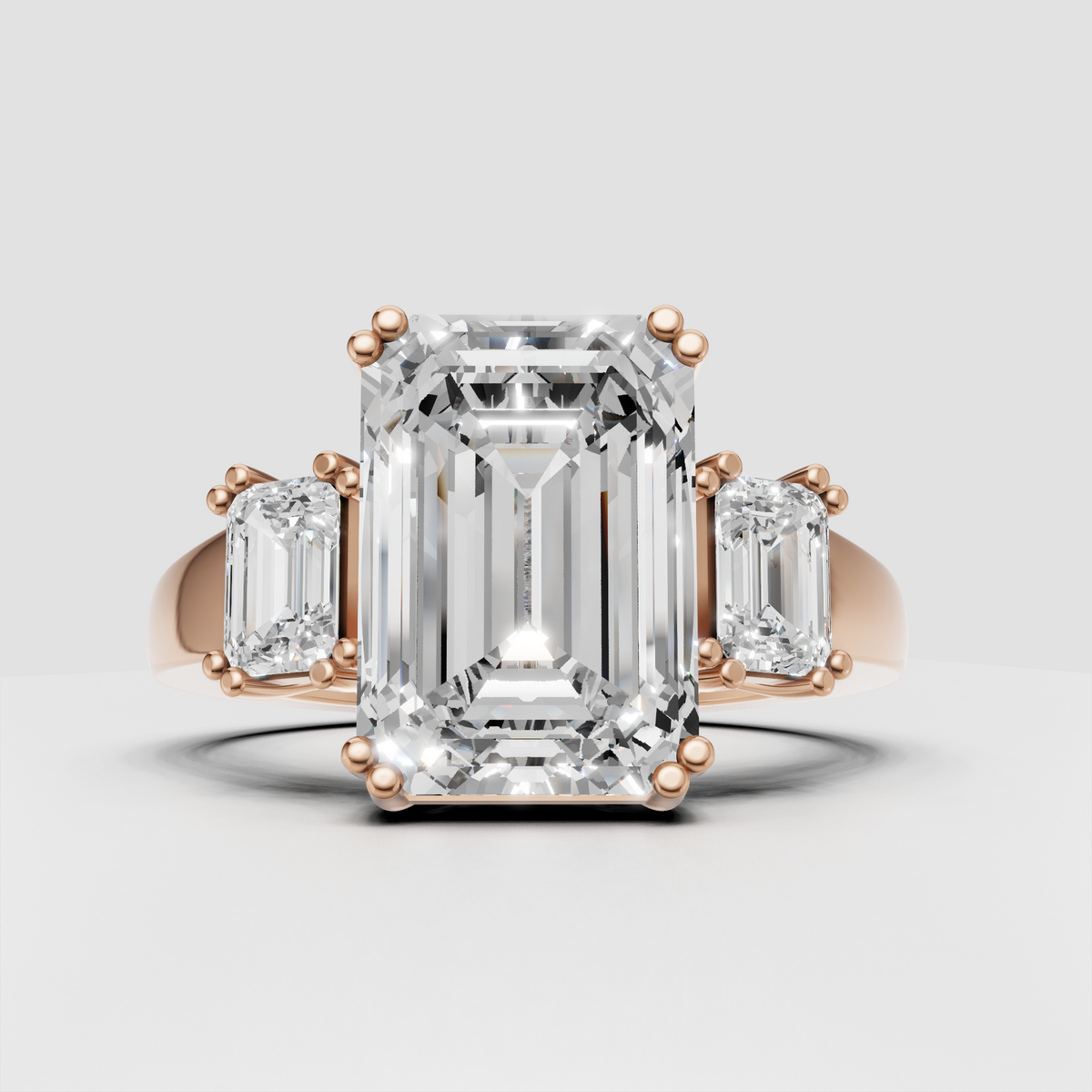 Polished yellow gold three stone diamond ring