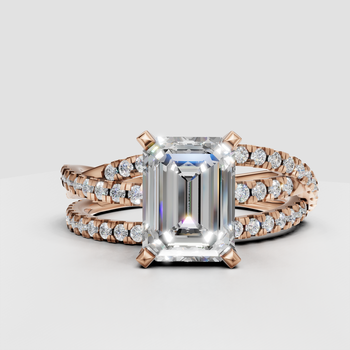 Contemporary rose gold emerald cut diamond engagement ring