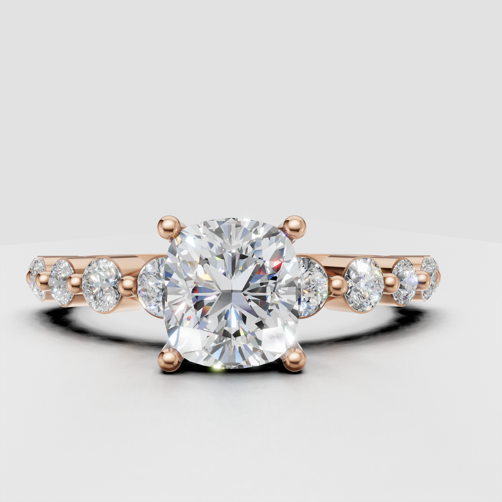 Cushion diamond bridal ring featuring a polished gold band