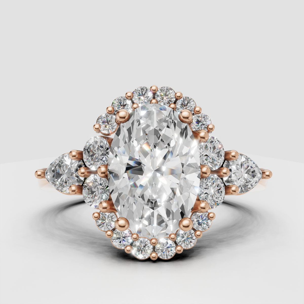 Oval canter diamond ring surrounded by a sparkling round stone halo