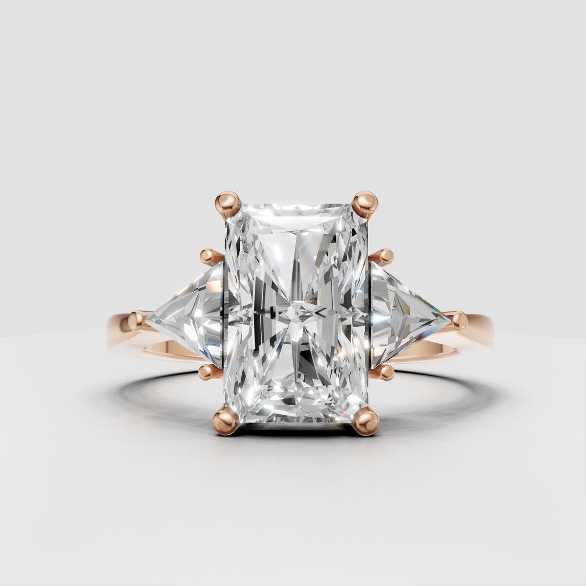 Modern radiant diamond engagement ring with open gallery and sculptural prongs