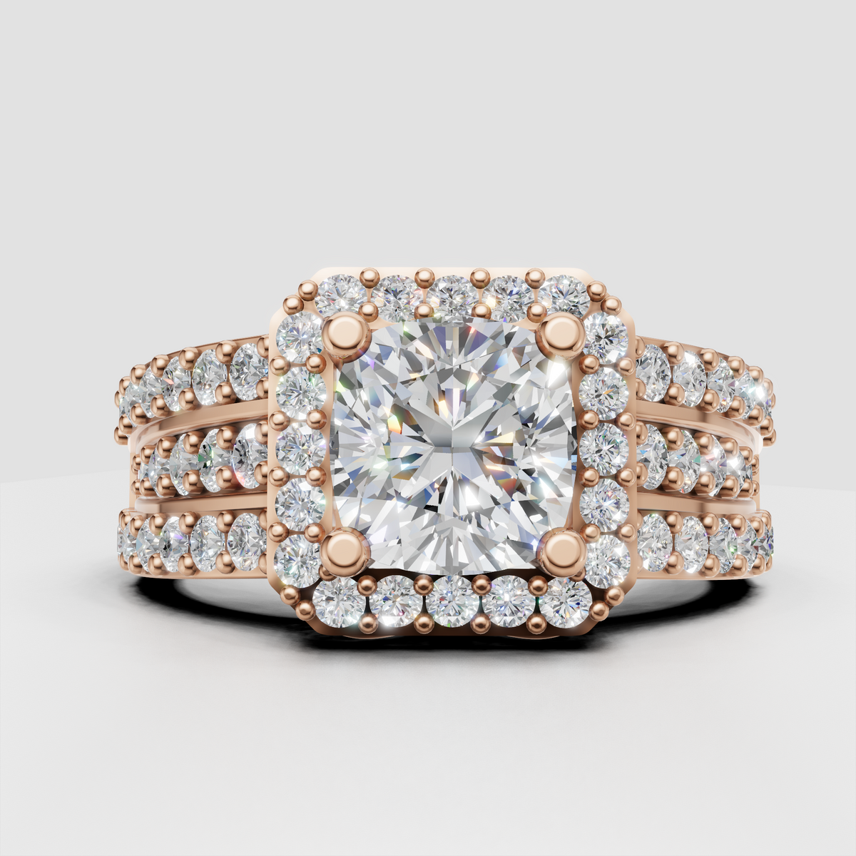 Cushion diamond halo ring with four-prong canter setting