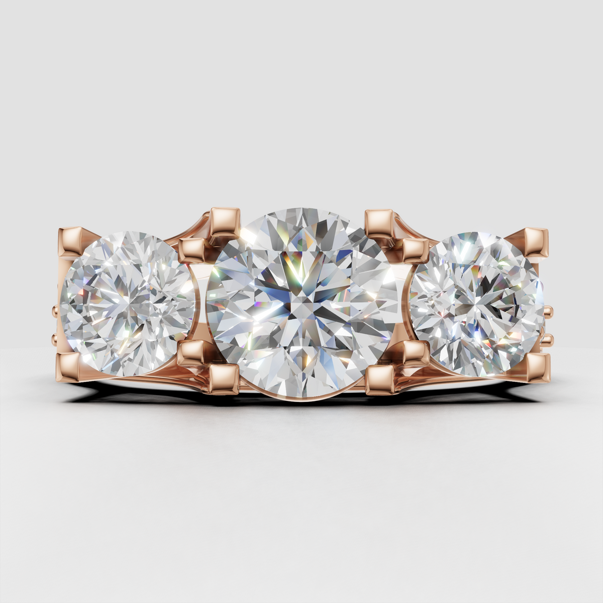 Elegant yellow gold trilogy Diamond ring with sculpted prong setting