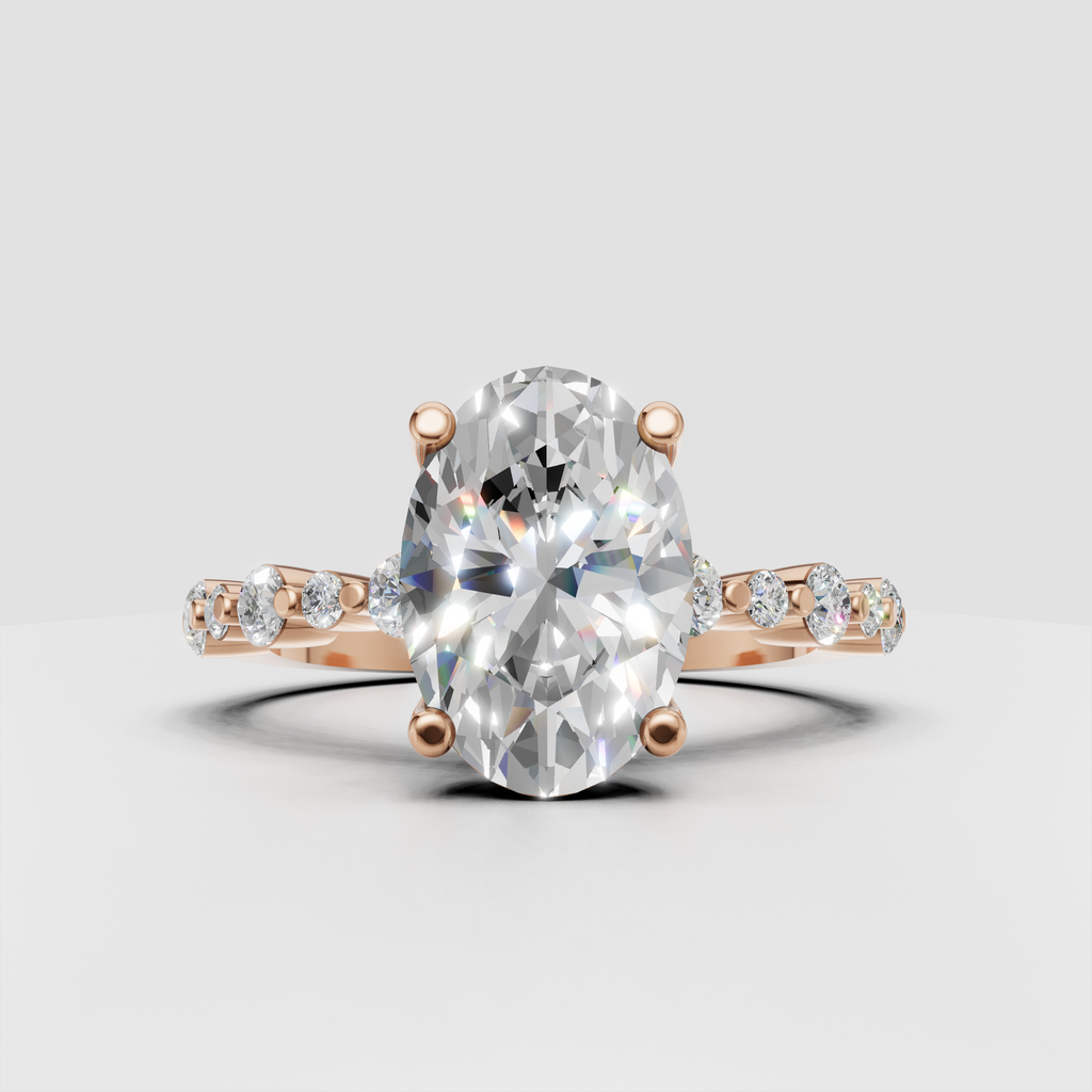 Polished yellow gold oval engagement ring with diamond accents