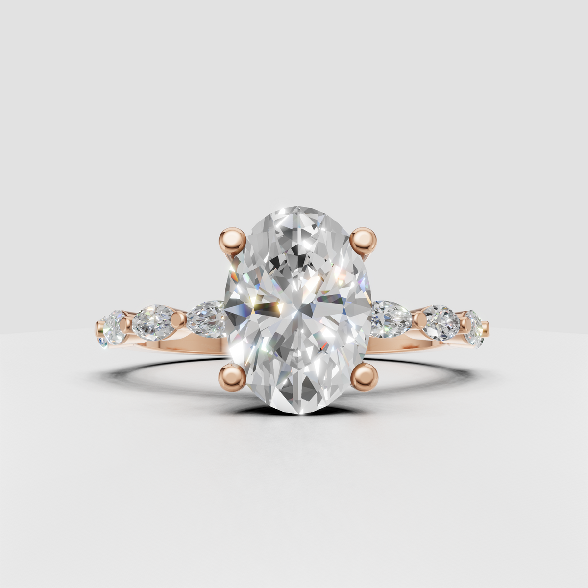 Yellow gold oval engagement ring with detailed diamond shoulders