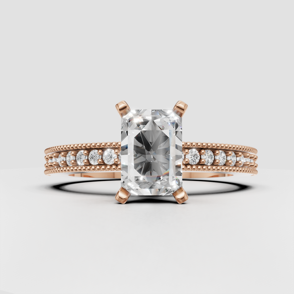 Yellow gold radiant diamond engagement ring with four-prong setting and side diamonds