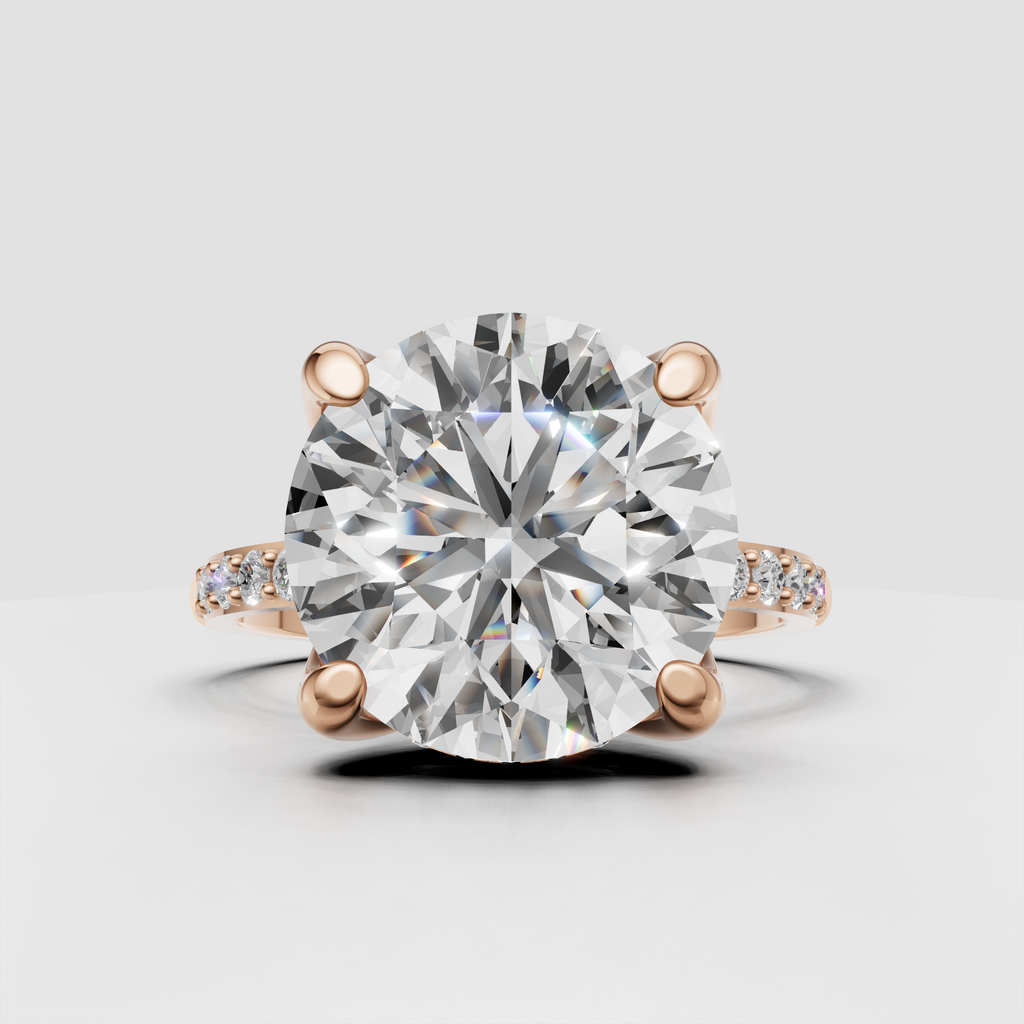 Side profile of round diamond engagement ring in yellow gold