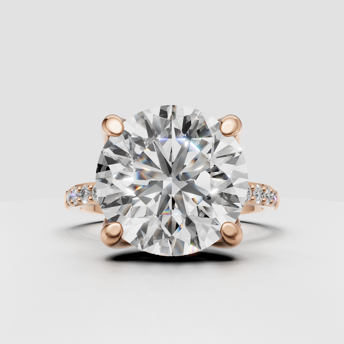 Side profile of round diamond engagement ring in yellow gold