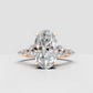 Yellow gold engagement ring with oval center diamond