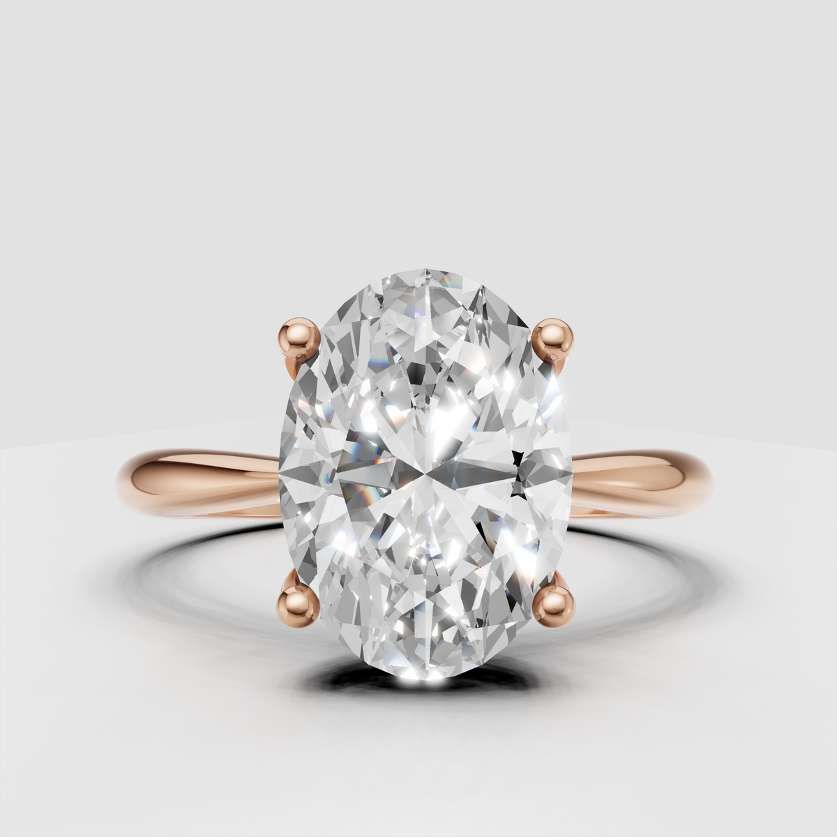 Elegant yellow gold oval Diamond ring with smooth tapered band