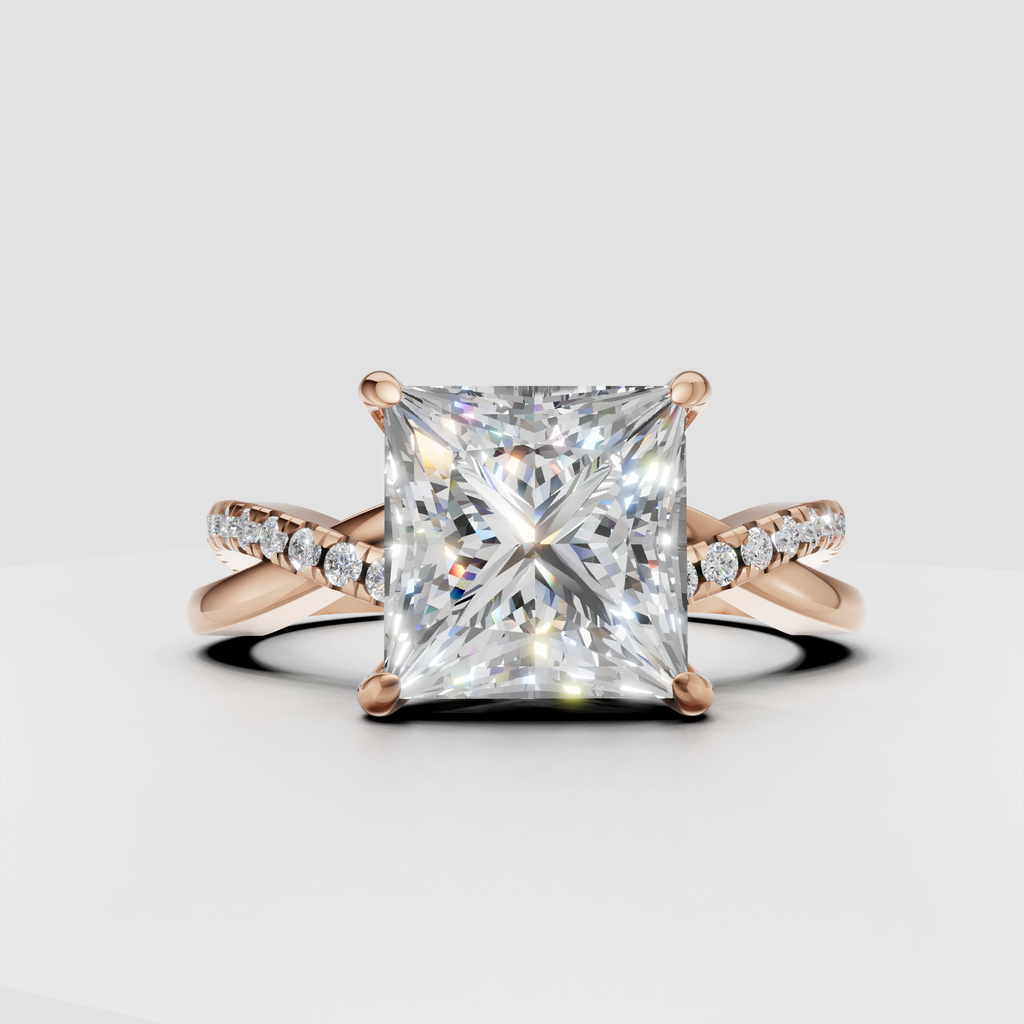 Princess cut center diamond in a four-prong crossover setting