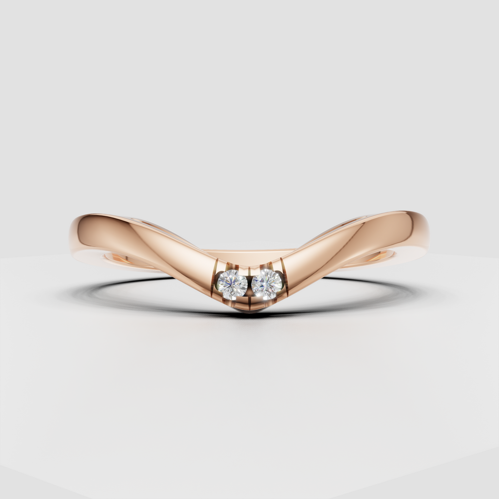 Contemporary yellow gold ring featuring two round cut diamonds