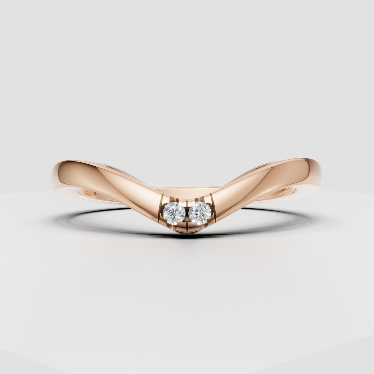 Contemporary yellow gold ring featuring two round cut diamonds