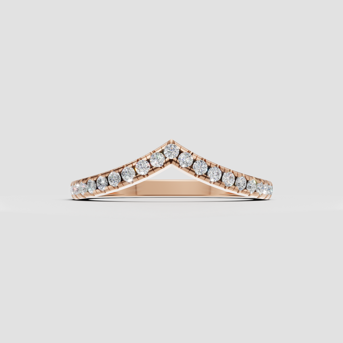 Rose gold V-shaped diamond band featuring multiple round brilliant-cut diamonds