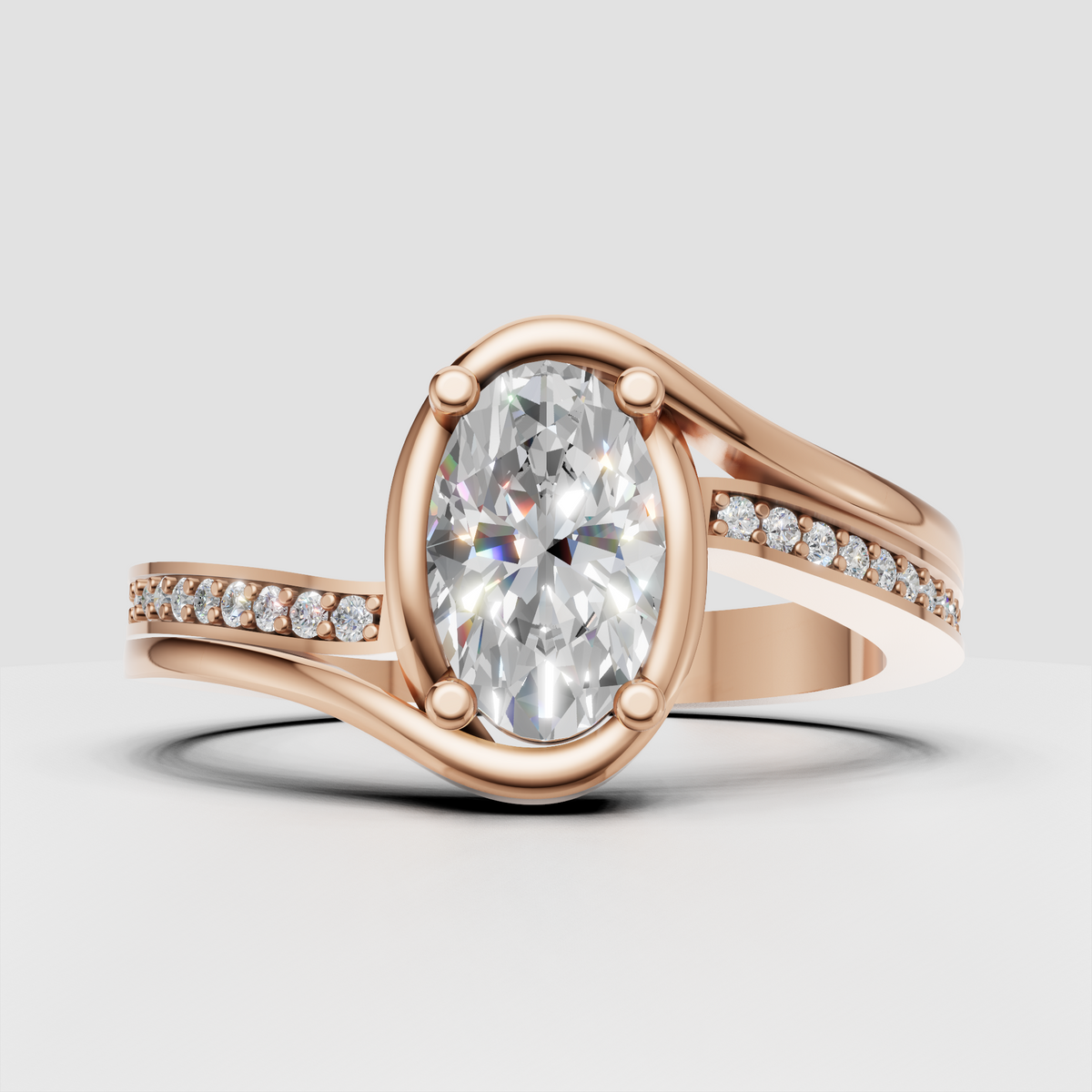 Oval cut center stone in a sculpted yellow gold bypass engagement ring setting