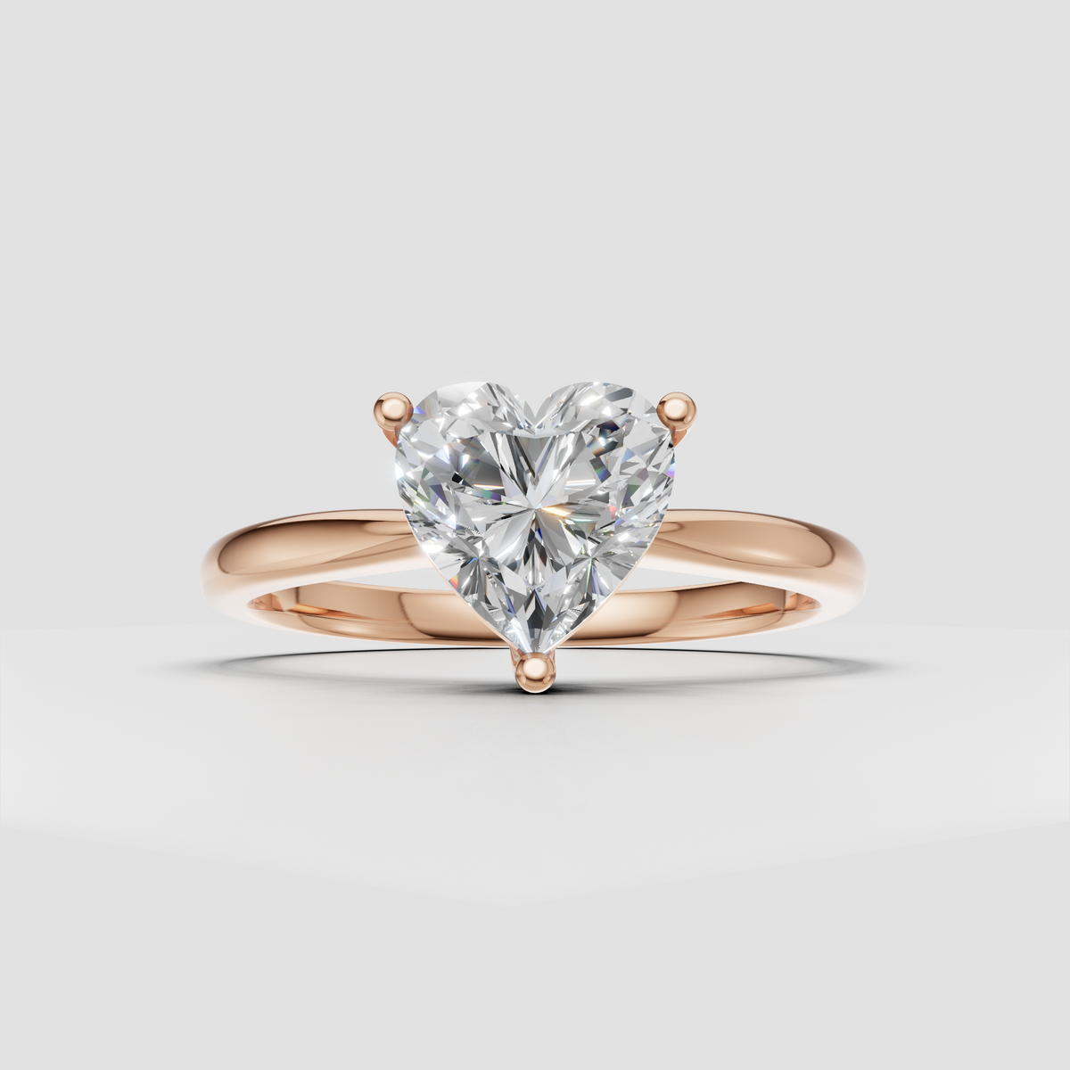 Classic heart diamond engagement ring with smooth rounded gold shank