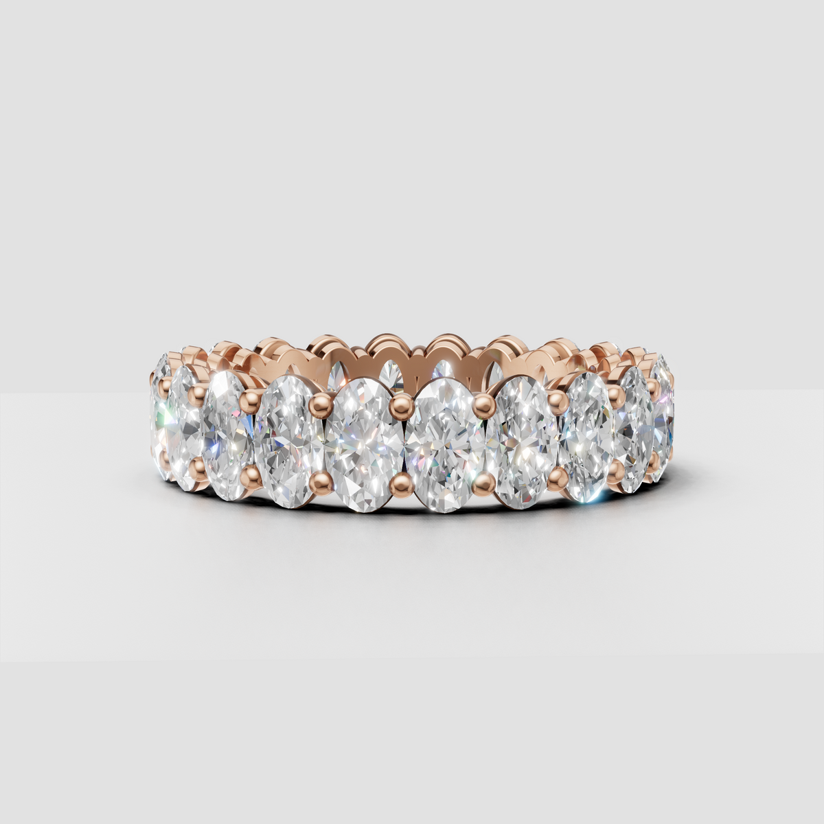 Brilliant oval cut diamond eternity band close-up