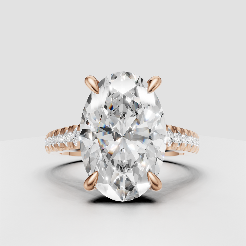 Oval solitaire with sparkling pavé shoulders