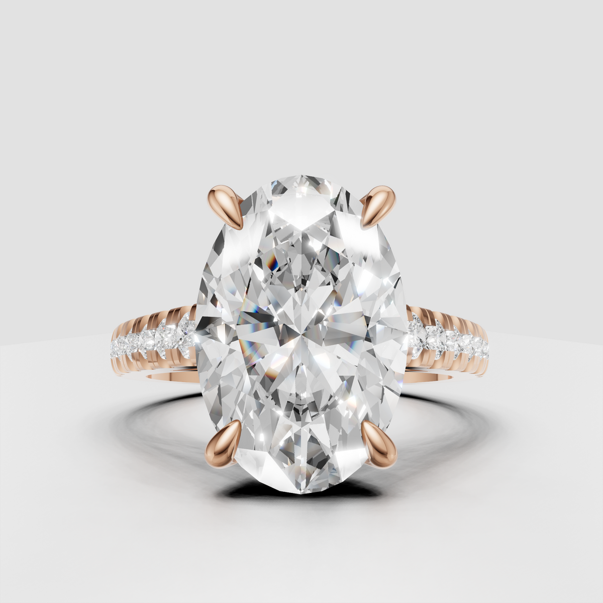 Oval solitaire with sparkling pavé shoulders