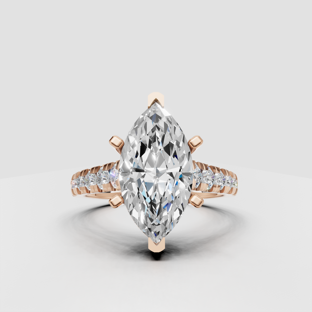 Marquise shaped center diamond secured by prongs with pavé side stones