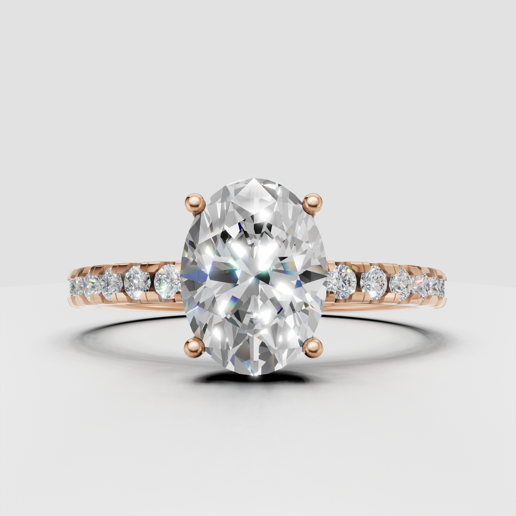 Oval diamond engagement ring with graduated pavé stones