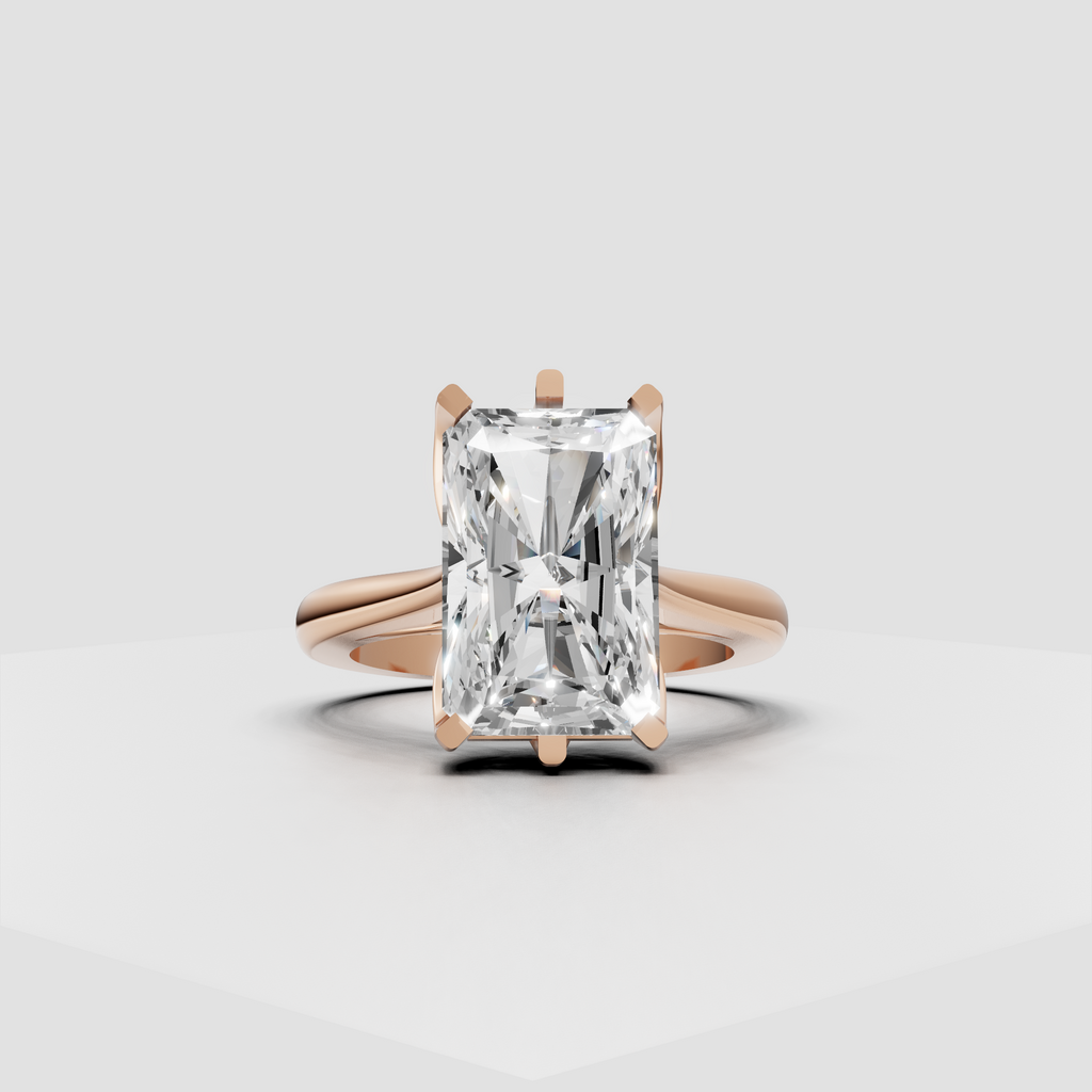Radiant diamond ring showcasing a polished crossover band and elevated setting