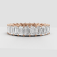 Classic emerald cut diamond eternity ring in yellow gold