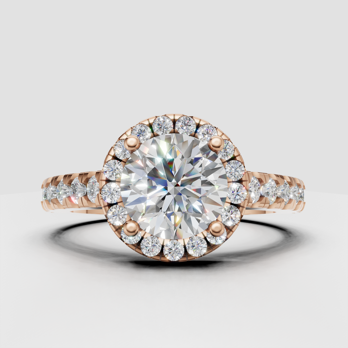 Round diamond ring with sparkling halo and pavé shoulders
