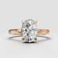 Oval cut diamond ring with sparkling hidden halo detailing