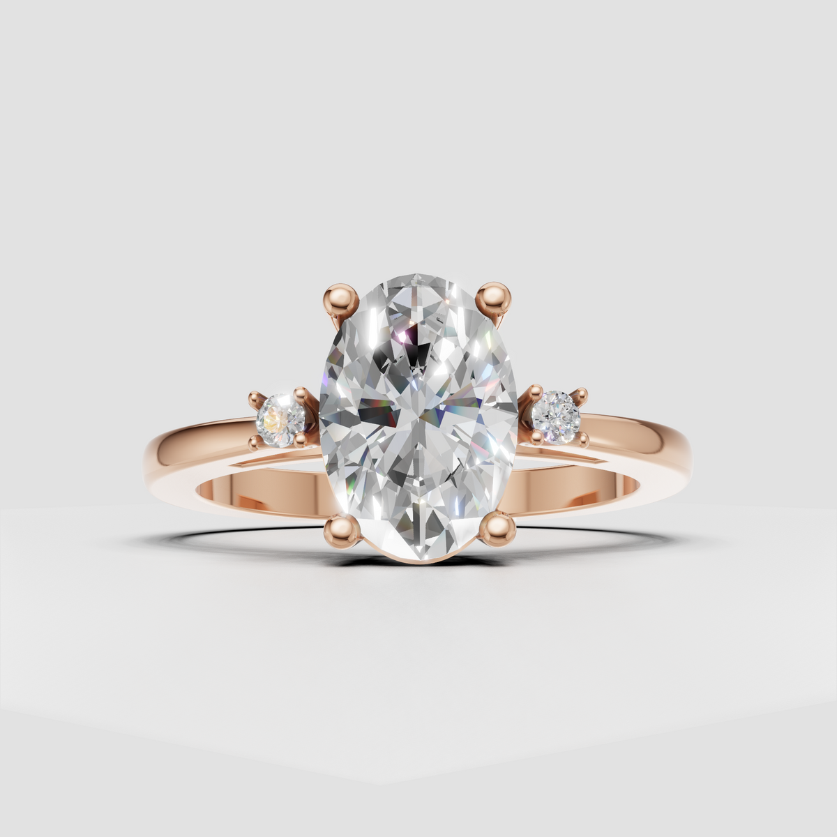 Oval center diamond ring with round side stones and gold band