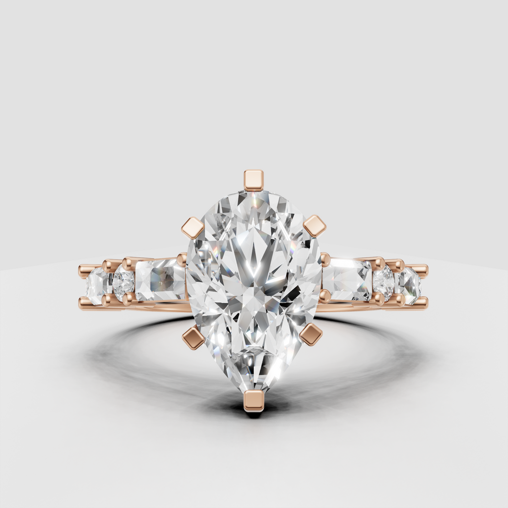 Pear shaped canter diamond with baguette accented shoulders