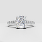 Cushion solitaire engagement ring with half pavé band