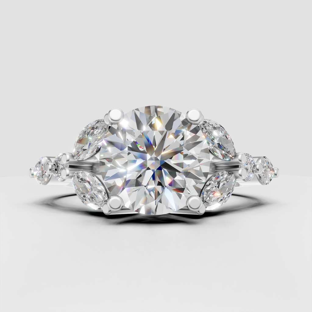 Yellow gold round diamond ring with marquise cluster side stones