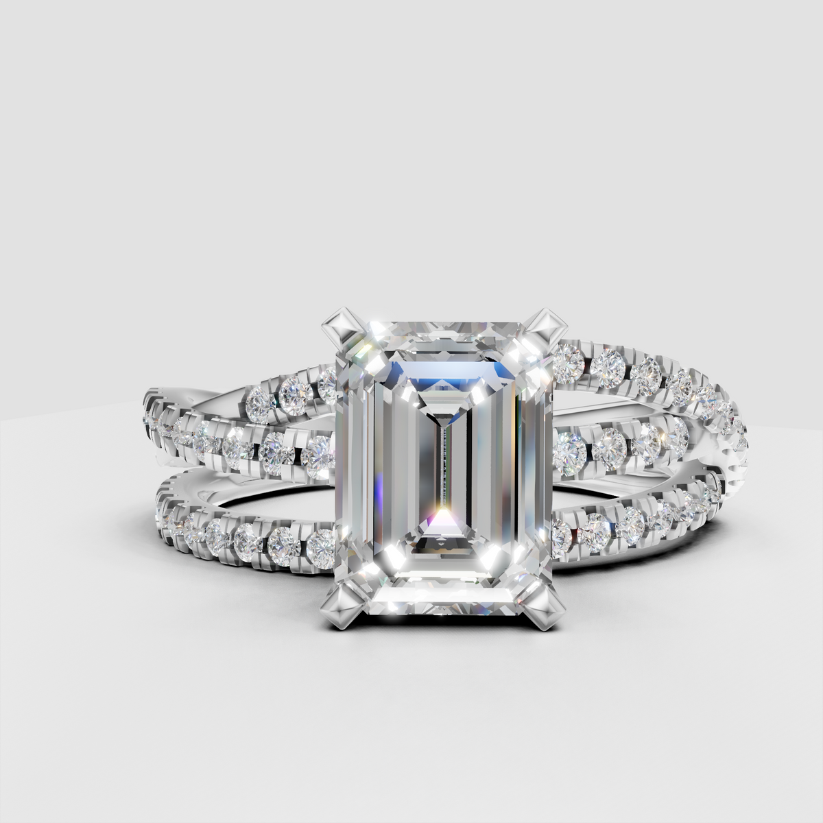 Emerald cut diamond ring with architectural four-prong setting