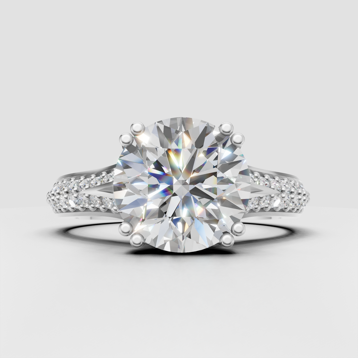 Round Diamond ring with prong-set center stone and sparkling micro pavé band